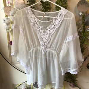 Free People sheer peasant top. Size small
